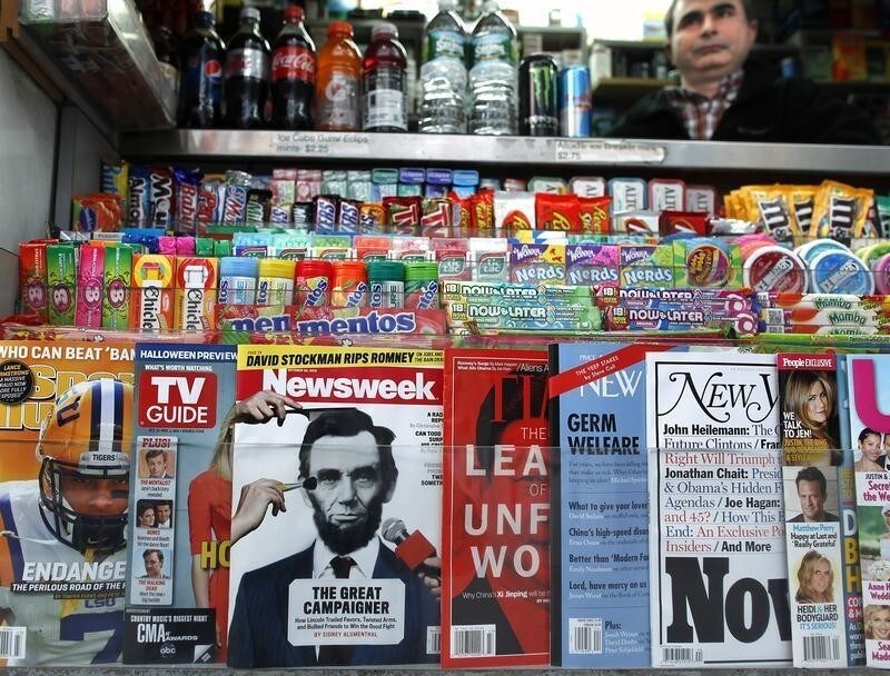 A copy of Newsweek magazine sits on a newsstand in New York October 18, 2012. Newsweek, the venerable U.S. weekly magazine covering current events, will publish its final print edition on Dec. 31 and move to an all-digital format early next year, two top executives said on Thursday. REUTERS/Carlo Allegri (UNITED STATES - Tags: MEDIA BUSINESS) - RTR39AUL