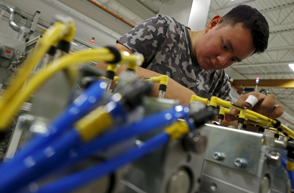 Christian Reyes works on some wiring at Felsomat in the Chicago suburb of Schaumburg, Illinois, United States, May 13, 2015: Gen Z’s talent profile is well-suited for modern manufacturing