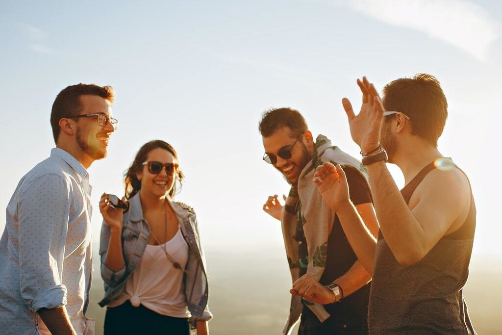 image of friends laughing and chatting