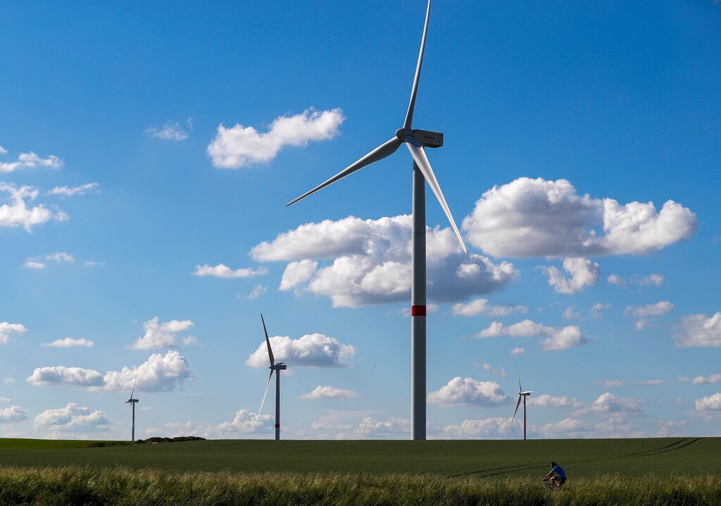 Power-generating wind turbines are seen near the city of Waremme, Belgium, May 30, 2018. REUTERS/Yves Herman