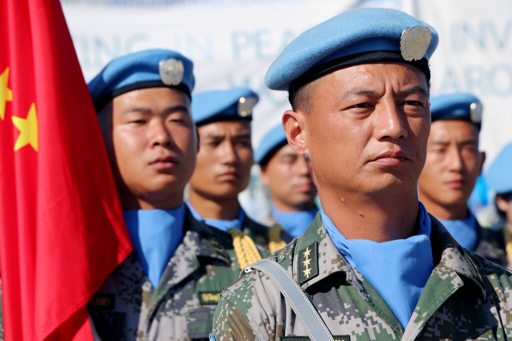 Chinese Peacekeepers in the United Nations Mission to South Sudan (UNMISS) parade during the International Day of United Nations Peacekeepers in Juba, South Sudan May 29, 2017. Picture taken May 29, 2017. REUTERS/Samir Bol - RC16795839E0