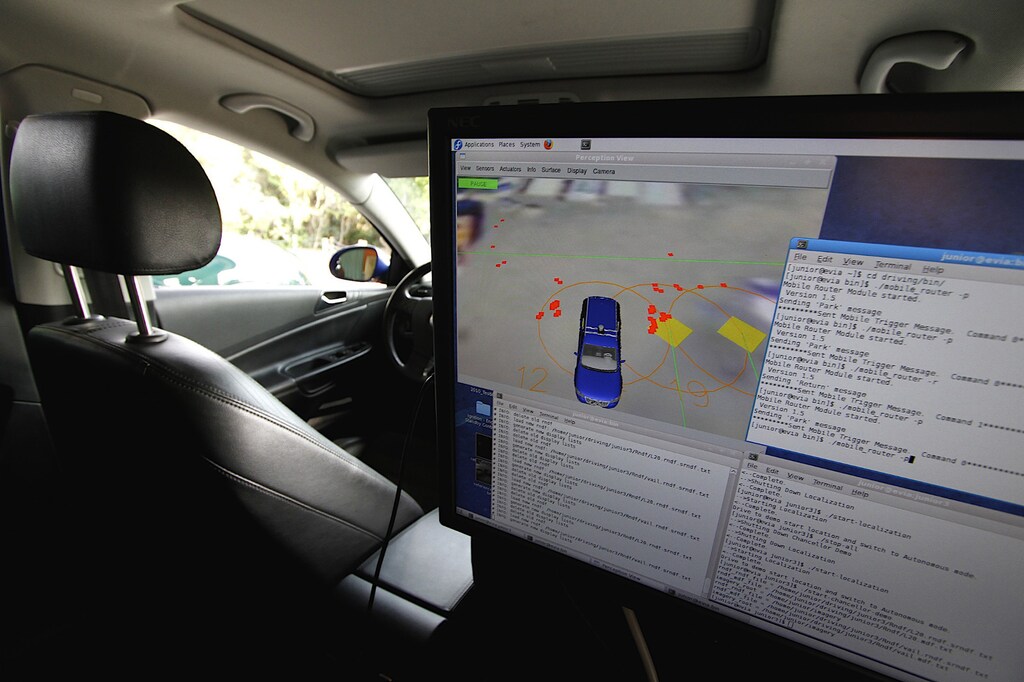 A monitor in the back seat displays sensor readings and other information in a driverless car at the Volkswagen Automotive Innovation Laboratory at Stanford University in Stanford, California April 15, 2010. REUTERS/Kevin Bartram (UNITED STATES - Tags: EDUCATION BUSINESS POLITICS TRANSPORT SCI TECH)