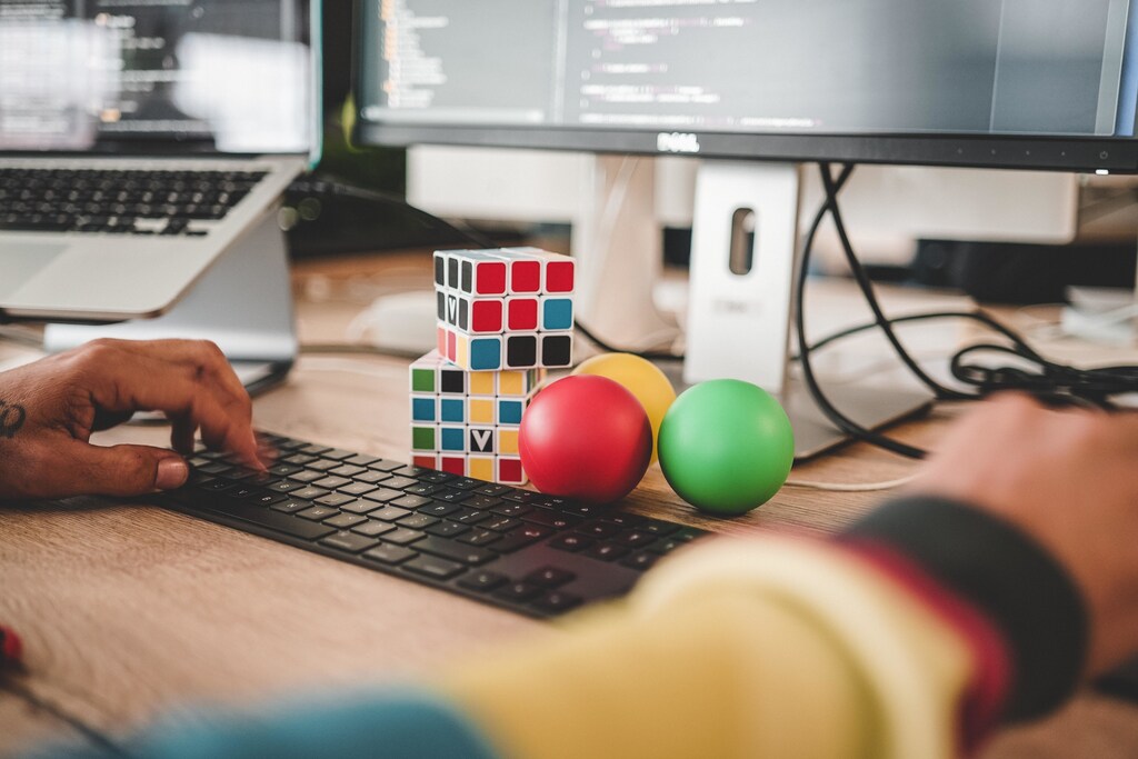 a picture of a desk with a puzzle toy on it