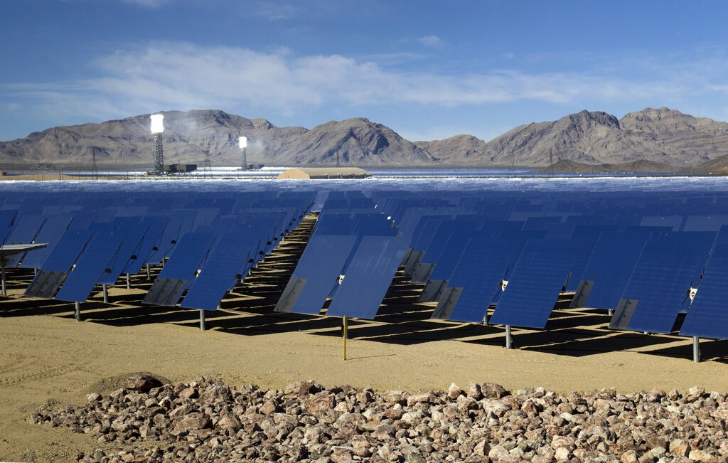 Heliostats (mirrors that track the sun and reflect the sunlight onto a central receiving point) are shown during a tour of the Ivanpah Solar Electric Generating System in the Mojave Desert near the California-Nevada border February 13, 2014. The project, a partnership of NRG, BrightSource, Google and Bechtel, is the world's largest solar thermal facility and uses 347,000 sun-facing mirrors to produce 392 Megawatts of electricity, enough energy to power more than 140,000 homes