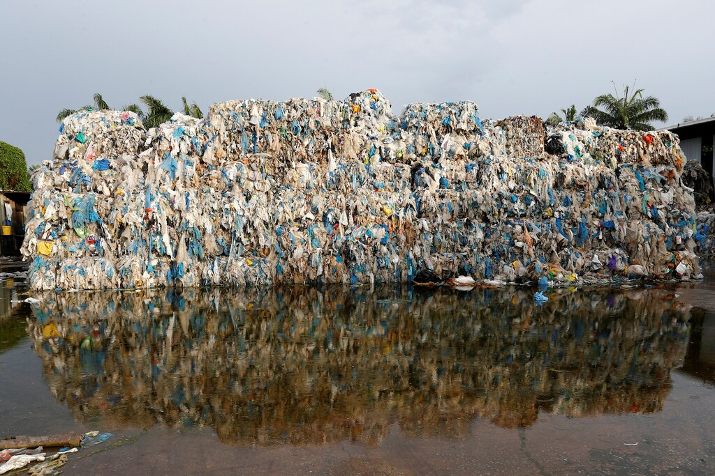 Plastic waste piled outside an illegal recycling factory in Jenjarom, Kuala Langat, Malaysia October 14, 2018. Picture taken October 14, 2018. REUTERS/Lai Seng Sin TPX IMAGES OF THE DAY - RC11BAB877D0