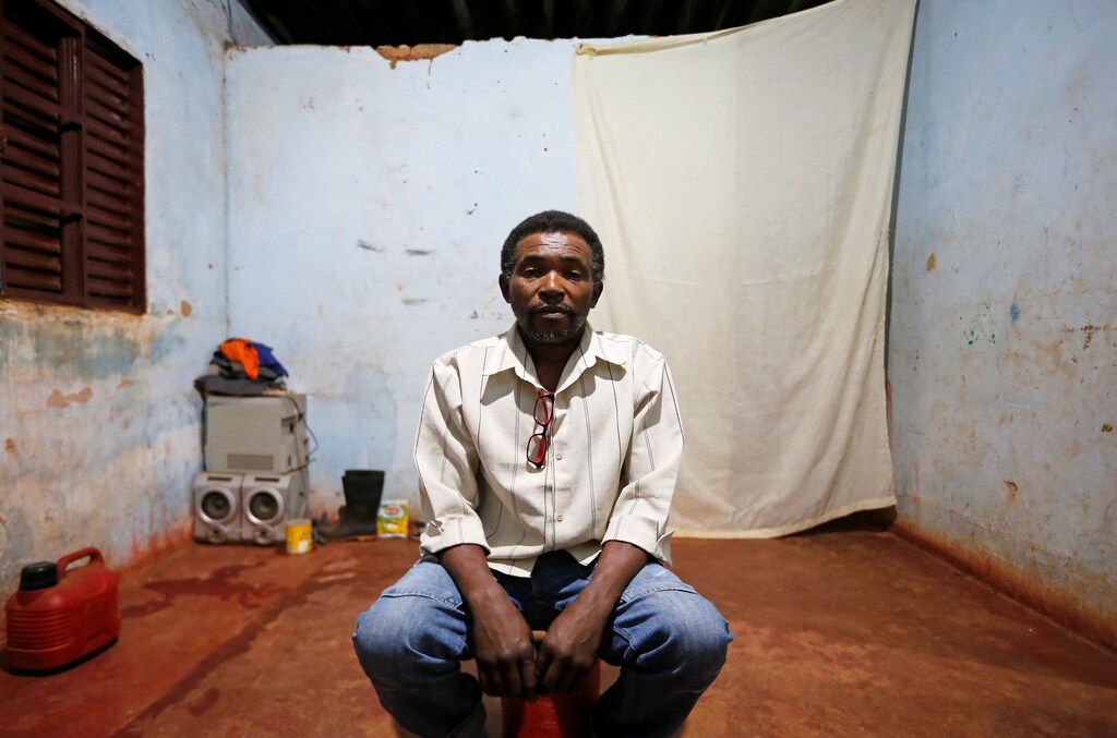 Genivaldo Batista dos Santos poses for a picture in his accommodation after working on a coffee farm, during a labor ministry operation to identify workers in conditions analogous to slavery, in Campos Altos, Minas Gerais State, Brazil August 13, 2019. Picture taken August 13, 2019. REUTERS/Adriano Machado - RC2NTD934C40