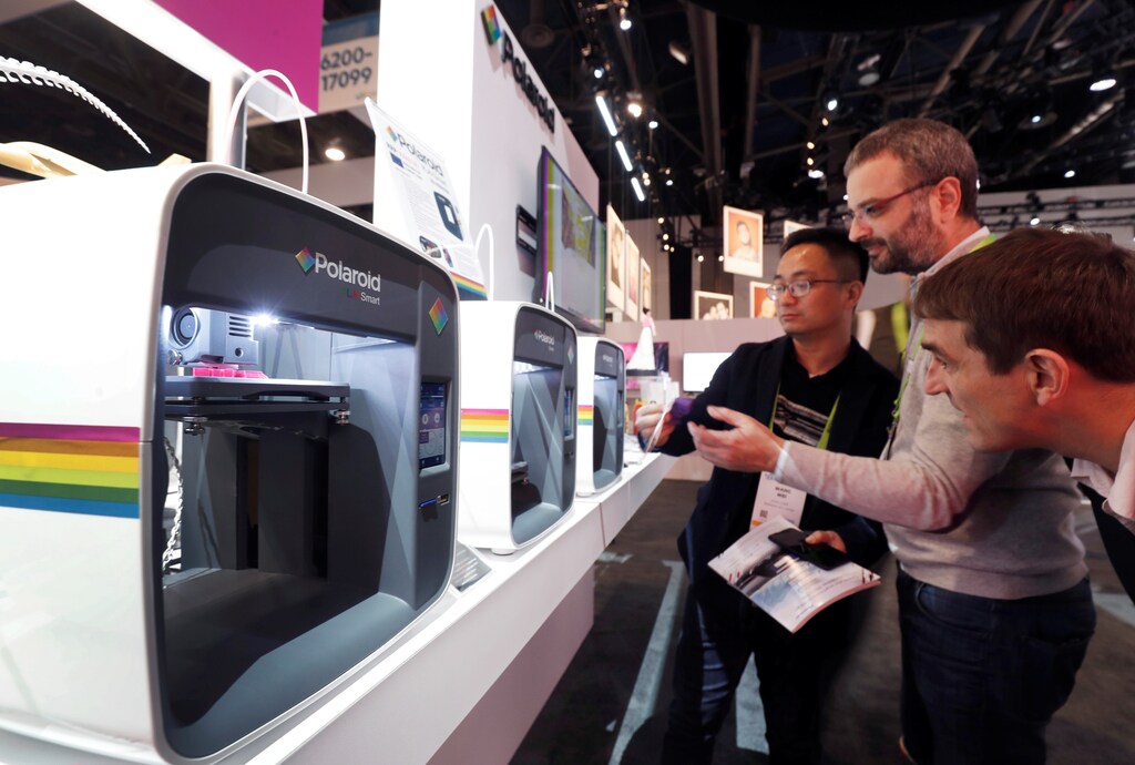 Polaroid PlaySmart 3D printers for the home are displayed during the 2019 CES in Las Vegas, Nevada, U.S. January 9, 2019. REUTERS/Steve Marcus - RC1B8B7EFA40