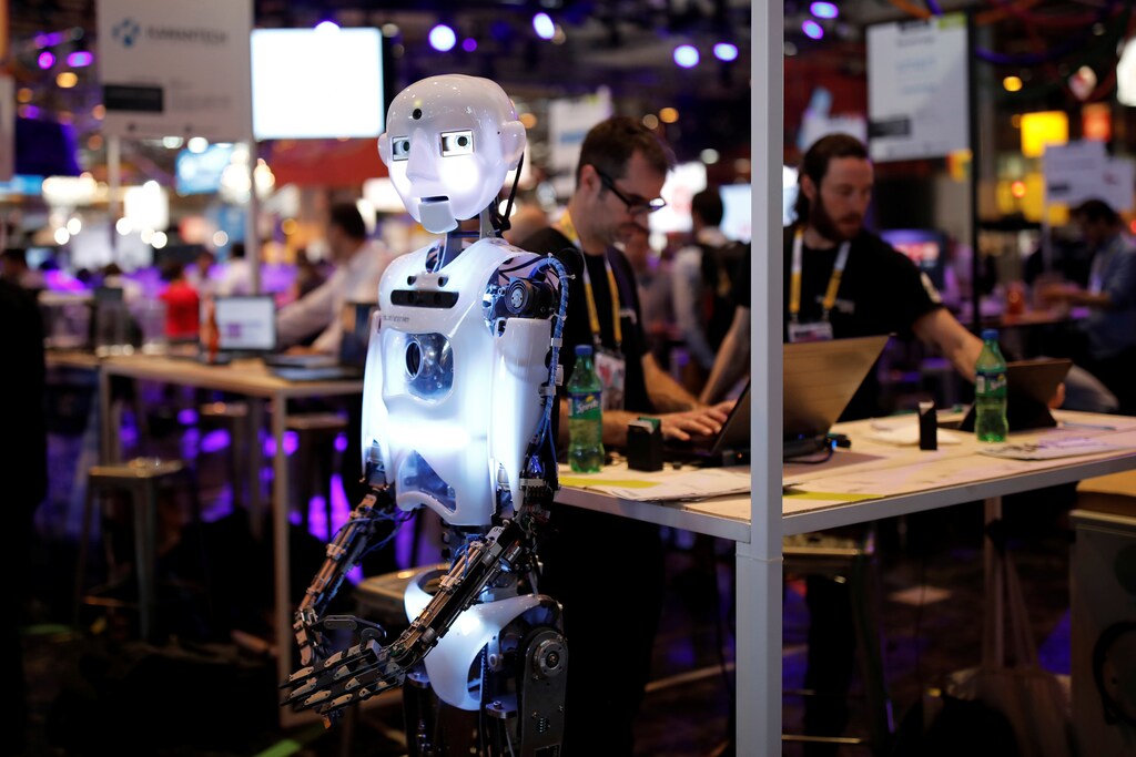A 'RoboThespian' humanoid robot, manufactured by Engineered Arts, stands at the Viva Technology conference in Paris, France, June 15, 2017. REUTERS/Benoit Tessier - RTS177JZ