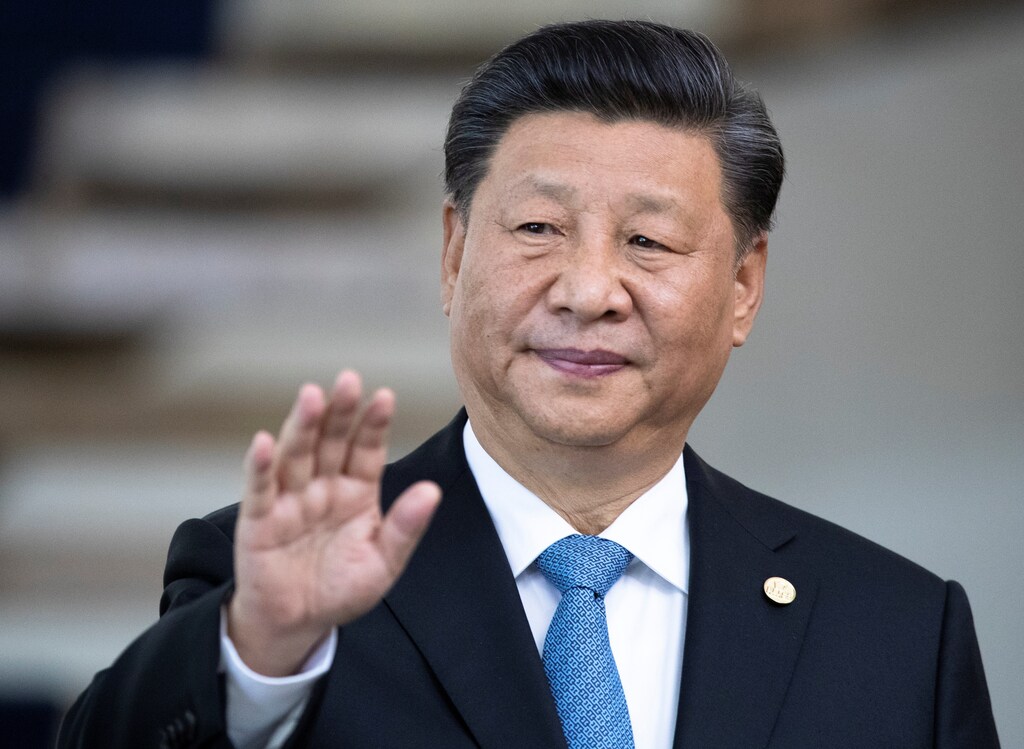 China's President Xi Jinping greets the media prior to the BRICS summit in Brasilia, Brazil November 14, 2019. Pavel Golovkin/Pool via REUTERS - RC22BD95XS08