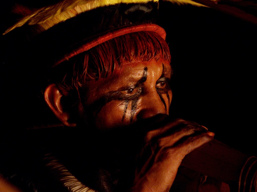 A member of the Yawalapiti tribe member plays a Urua flute as part of aritual of "good energies," at their village in Alto Xingu in the lowerAmazon, May 12, 2002. Four tribe members go from hut to hut, performingthe ritual the during year leading up to a Quarup festival, or 'ritualof the dead'. Once on the border of extinction, the Yawalapiti havebuilt their tribe up to 180 members from just seven some 50 years agothrough inter-marriage with other Xinguano tribes in the same culturalarea. The tribe lives almost exclusively from fishing and are famousfor their "Quarup" festival, which takes place in the year followingthe death of a tribe member of chieftan family lineage. SECOND OF SIXPICTURES REUTERS/Gregg NewtonGN/HB - RP3DRHZARYAA