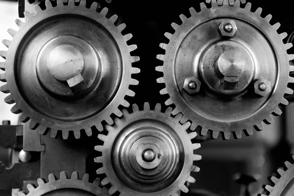 Silver metal cogs connected