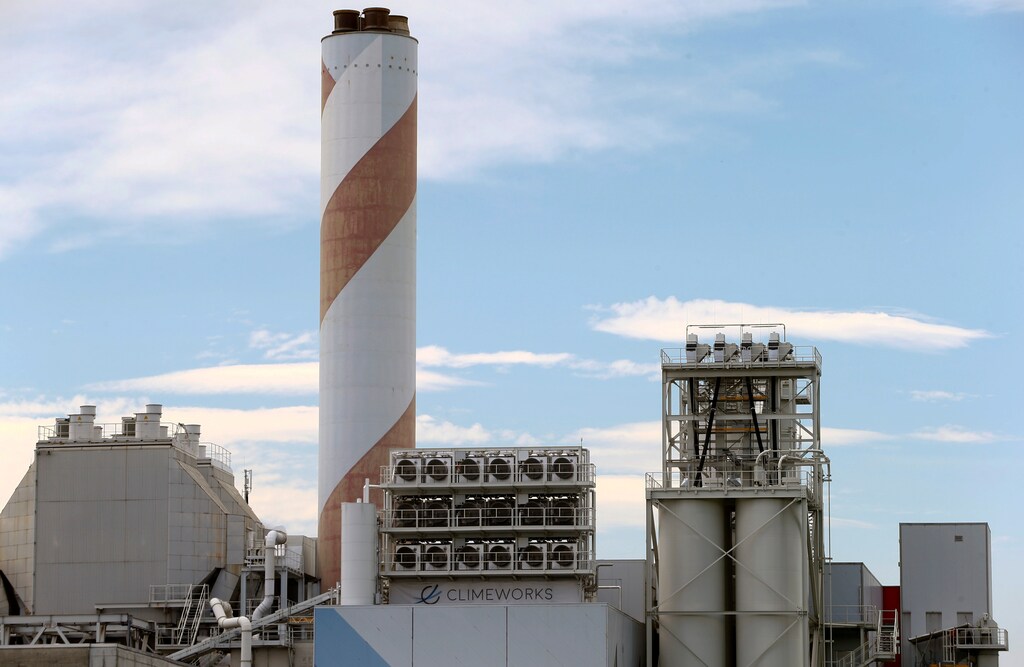 A facility for capturing CO2 from air of Swiss Climeworks AG is placed on the roof of a waste incinerating plant in Hinwil, Switzerland July 18, 2017. Picture taken July 18, 2017.