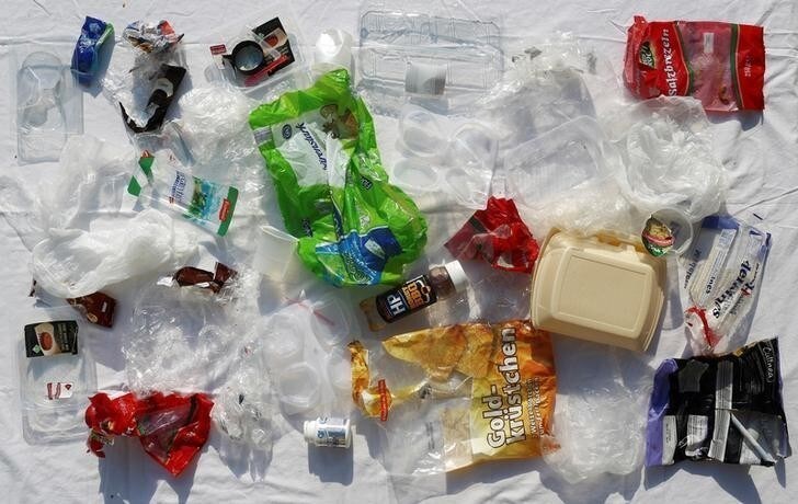 One week's worth of plastic waste, used and collected by Alexander Raduenz's family, is displayed in Berlin, Germany, May 28, 2018. "We try to lower our carbon footprint as much as possible. We are pretty much aware of the impact plastic has on our environment," said Alexander. "If alternatives to plastic are available, we are using them instead." REUTERS/Hannibal Hanschke