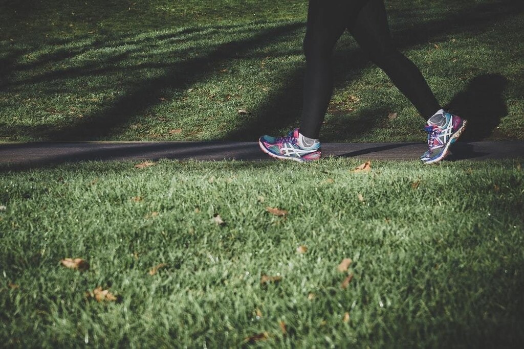 Lady running in a park in London