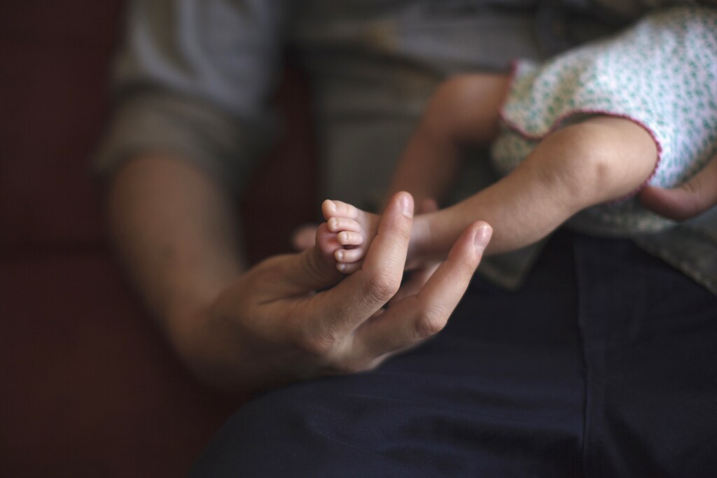 Antonio Fernandez holds one of his twins, daughter Olivia, in the house where he lives with husband Luis Delgado in Cancun February 24, 2015. The gay married couple from Spain who used a Mexican surrogate are unable to return to Spain with their new-born twins as they are unable to secure passports for their babies. The surrogate gave birth to the twins in Tabasco on January 6 but Mexico has refused to give Delgado and Fernandez passports to take the twins home. According to El Pais newspaper, the couple cannot be granted passports due to a conflict of interest. The state of Tabasco recognizes surrogate births but the Ministry of Foreign Affairs does not. It is illegal for couples to have babies via surrogates in Spain but if the country where the baby was born officially confirms the couple are the biological parents, then Spain will be able to register them. If not, the mother must appear in the paperwork, El Pais reported. REUTERS/Victor Ruiz Garcia