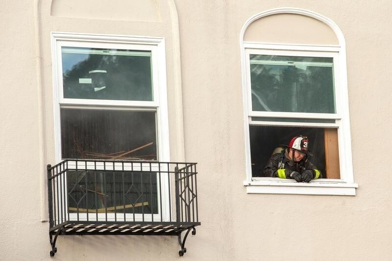 Firefighters battle a fire following an explosion at Geary boulevard and Parker Avenue in San Francisco, California, U.S., February 6, 2019. MANDATORY CREDIT. TV OUT. NOT FOR SALE TO TELEVISION BROADCASTERS. MAGAZINES OUT. - RC174AC8A3E0