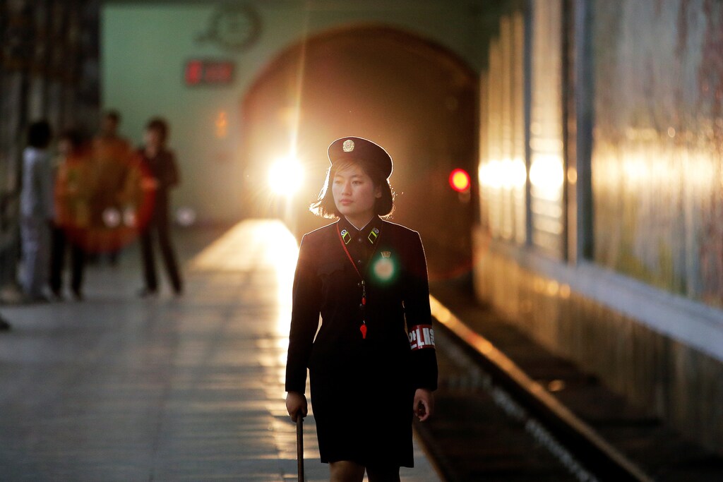 A subway worker walks away after a train departed the station in central Pyongyang, North Korea May 7, 2016. REUTERS/Damir Sagolj TPX IMAGES OF THE DAY - RTX2D7NR