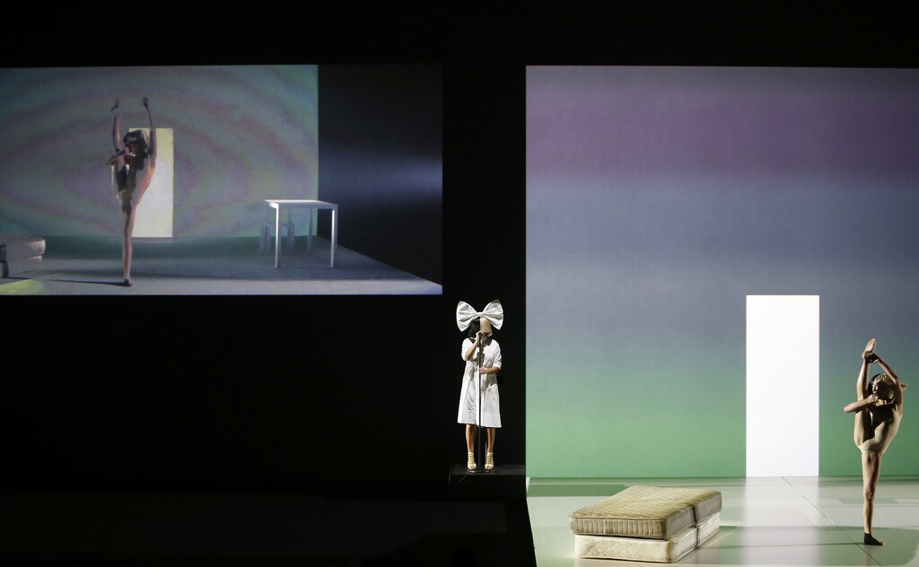 Singer Sia and dancer Maddie Ziegler perform during an Apple media event in San Francisco, California, U.S. September 7, 2016. REUTERS/Beck Diefenbach - RTX2OJWS