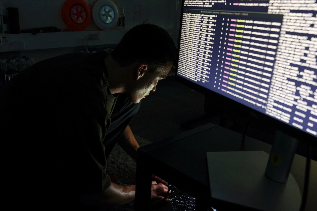 AI and cybersecurity researcher Fred Heiding at work.