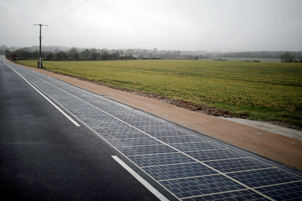 A solar panel road is pictured during its inauguration in Tourouvre, Normandy, northwestern France, December 22, 2016. REUTERS/Benoit Tessier - RTX2W5WT