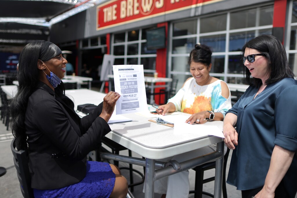 Sandra Presley, 57, attends a job fair for restaurant and hotel workers, after coronavirus disease (COVID-19) restrictions were lifted, in Torrance, near Los Angeles, California, U.S., June 23, 2021. REUTERS/Lucy Nicholson - RC2L6O9X8YAI