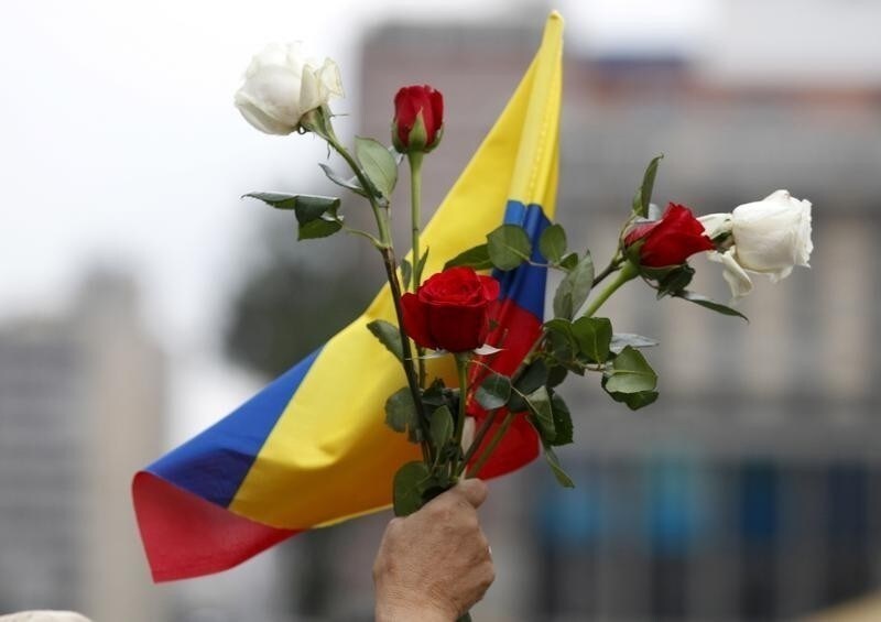 Demonstrators take part in a protest against the Revolutionary Armed Forces of Colombia (FARC) as they ask for changes to a peace agreement between FARC and President Juan Manuel Santos' government in Bogota, Colombia April 2, 2016