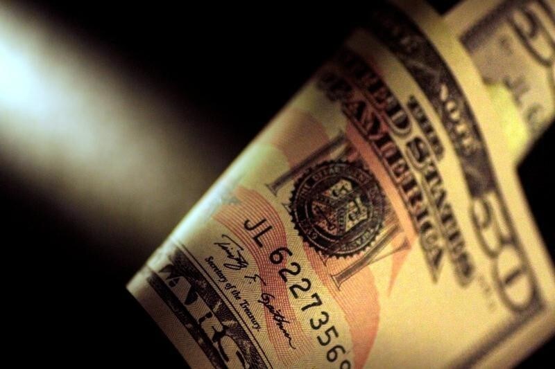 A U.S. Dollar note is seen in this June 22, 2017 illustration photo. REUTERS/Thomas White/Illustration - RC17AB6D43D0