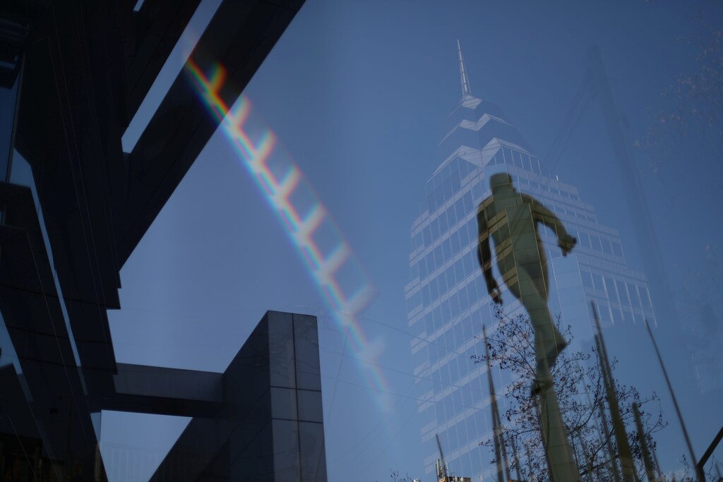 A building and a sculpture are reflected on glass in a wealthy neighborhood, during a general quarantine imposed due to a surge of fresh coronavirus disease (COVID-19) cases, in Santiago, Chile May 18, 2020. REUTERS/Ivan Alvarado - RC2CRG97YIIJ