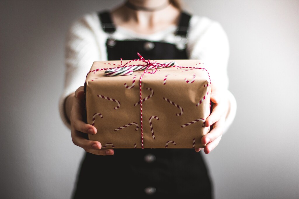 Person holding a present.