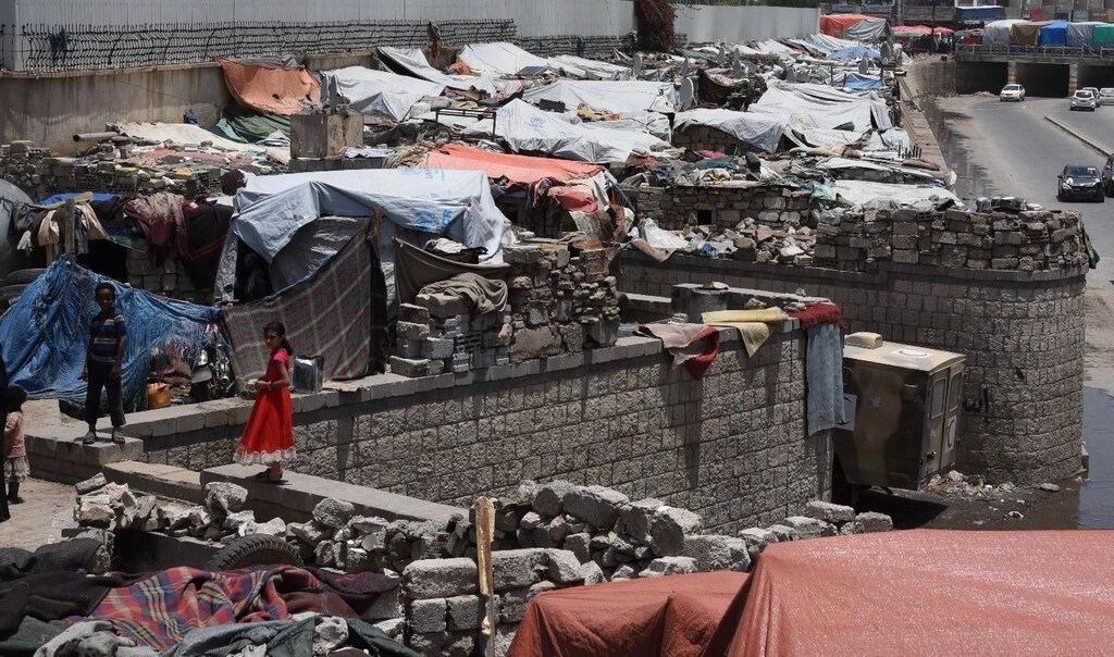 Children play at the Al Habbari informal camp for displaced people in Sana’a, Yemen