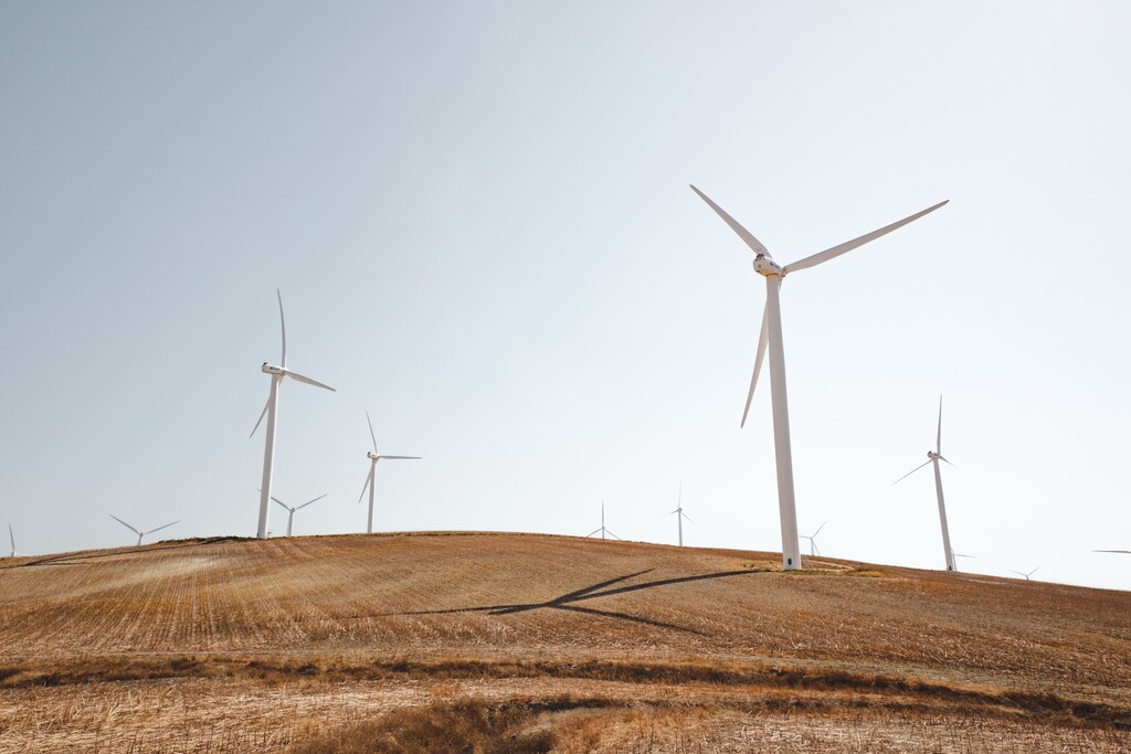 Electric windmills during the day Cádiz, Spain: Banks can aid a people-centred approach to deliver an ambitious climate transition.