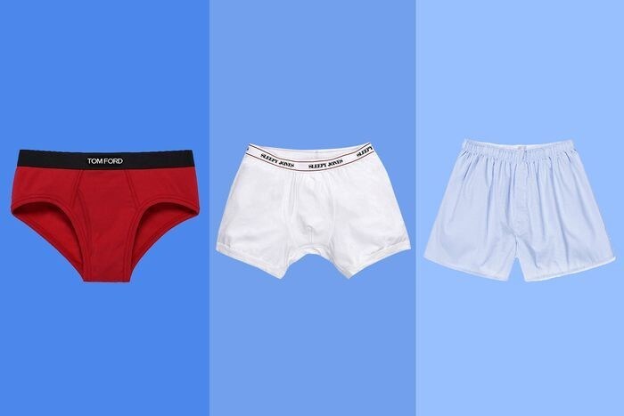 A red white and blue pair of male boxers are lined up next to each other.