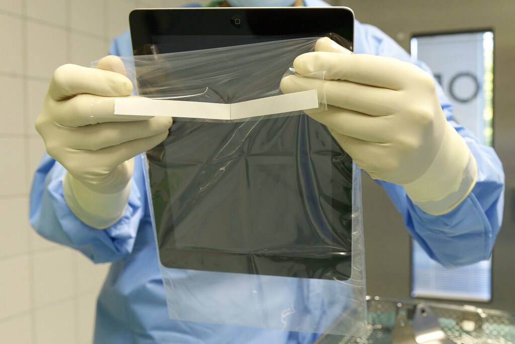 A German surgeon bags up a tablet computer used to help with liver surgery