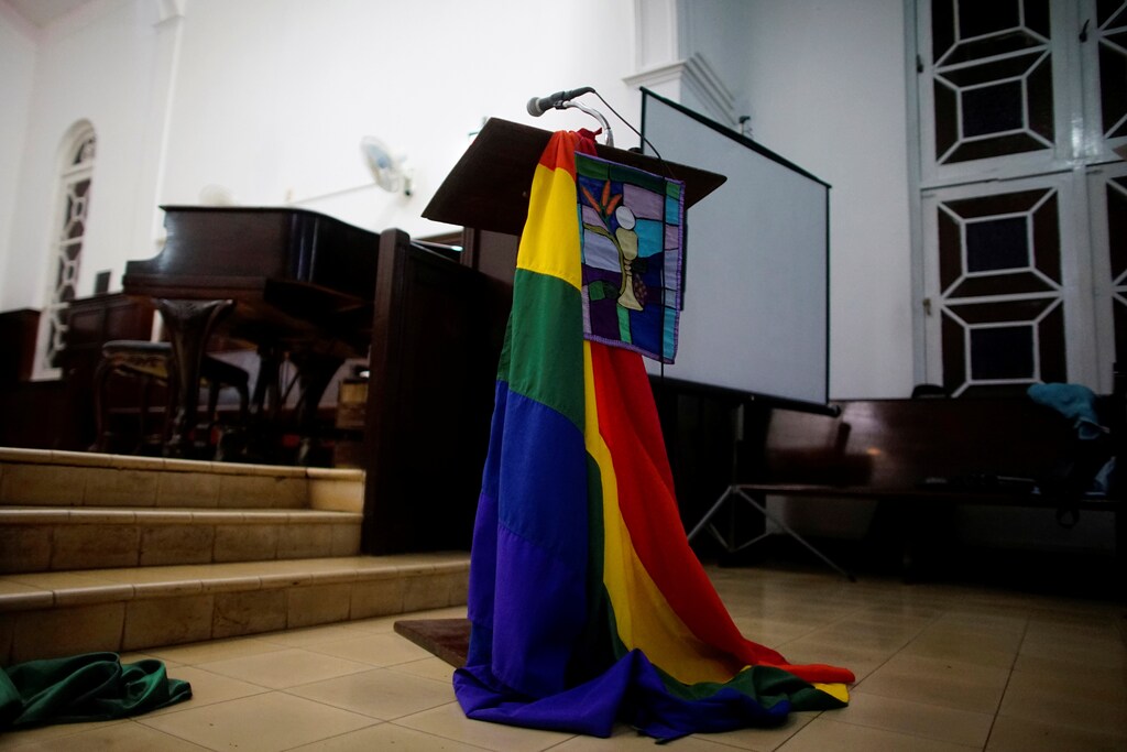 A rainbow flag decorates a chapel before a mass in Matanzas, Cuba.