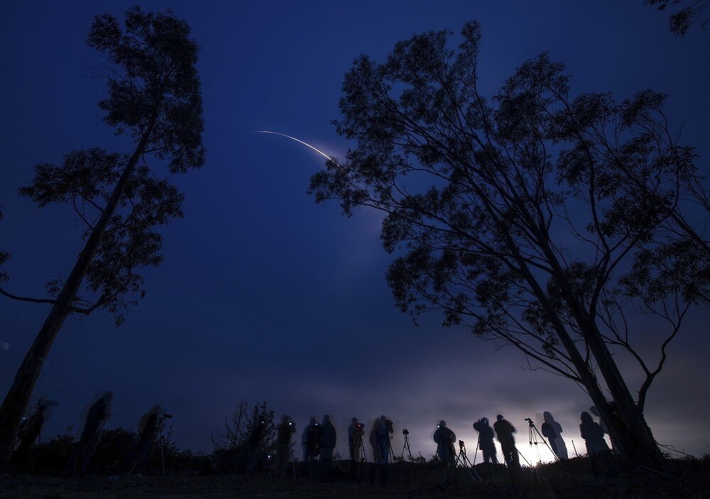 A United Launch Alliance Delta II rocket with the NASA Soil Moisture Active Passive (SMAP) observatory onboard is seen in this long exposure photograph as it launches from Space Launch Complex 2 at Vandenberg Air Force Base, California January 31, 2015. The unmanned rocket is carrying a satellite to measure how much water is in Earth?s soil, information that will help weather forecasting and tracking of global climate change.