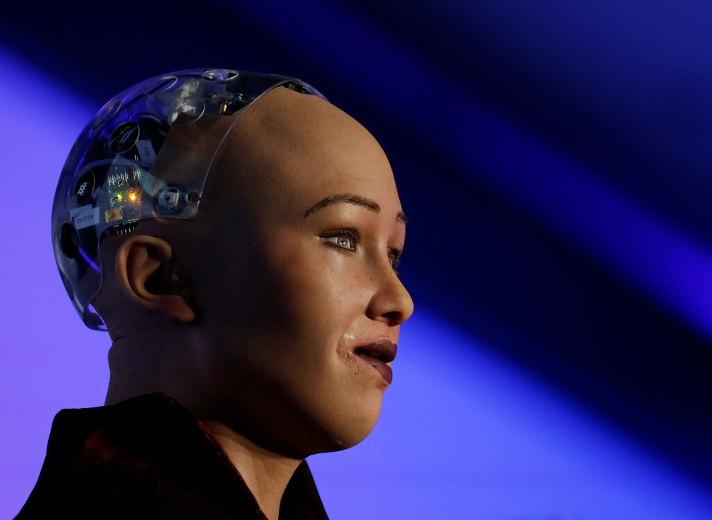The humanoid robot Sophia, a creation of Hanson Robotics, is seen during a presentation at the Malta Blockchain Summit in St Julian's, Malta November 1, 2018. REUTERS/Darrin Zammit Lupi - RC1BD8D71FE0