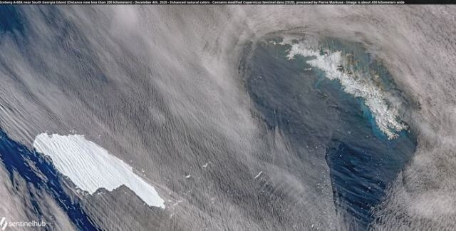 A satellite image of the A-68A iceberg (L) as it approaches South Georgia island (R) in the South Atlantic, December 4, 2020. Picture taken December 4, 2020.