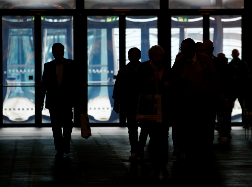 Shareholders arrive prior to the annual shareholder meeting of Commerzbank AG in Frankfurt, Germany May 3, 2017. REUTERS/Ralph Orlowski - RTS14WHS