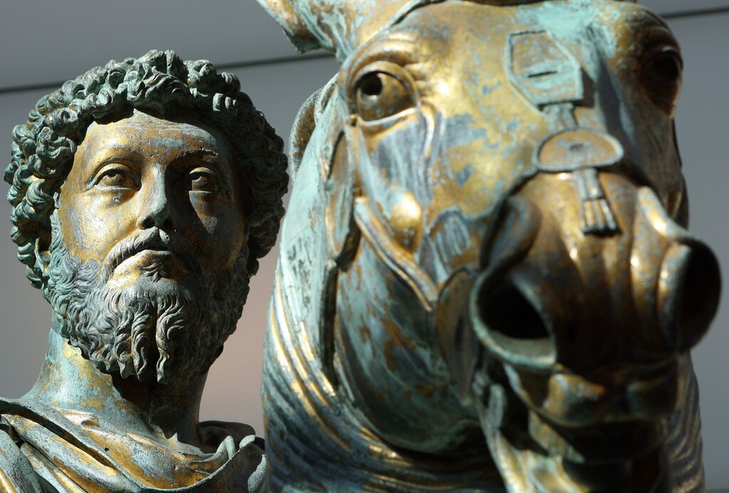 The gilded bronze equestrian statue of Marcus Aurelius, dating to the Roman emperor's reign, appears in its new hall at the Capitoline museum in Rome December 22, 2005. [Rome's Mayor Walter Veltroni] led the inauguration of the museum's new hall, [designed by architect Carlo Aymonino], on Thursday. - PBEAHUNTTFI