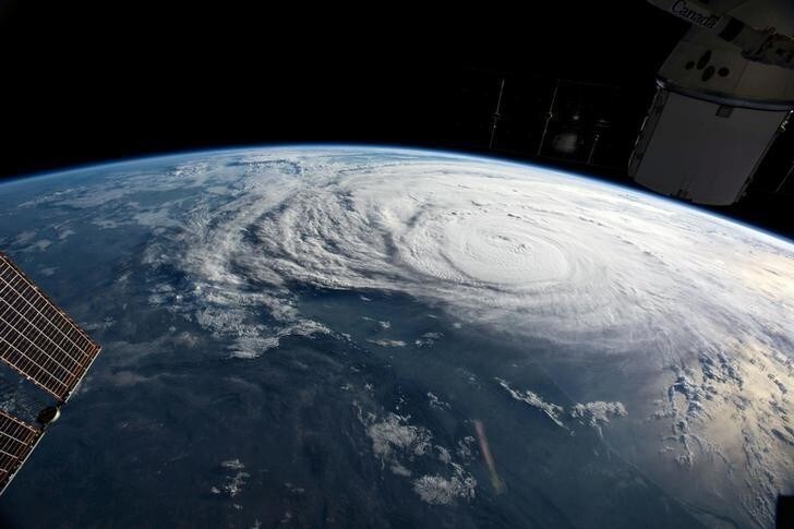 Hurricane Harvey is pictured off the coast of Texas, U.S. from aboard the International Space Station in this August 25, 2017 NASA handout photo. To match Special Report USA-FLOODS/INSURANCE NASA/Handout via REUTERS ATTENTION EDITORS - THIS IMAGE WAS PROVIDED BY A THIRD PARTY. THIS PICTURE WAS PROCESSED BY REUTERS TO ENHANCE QUALITY.