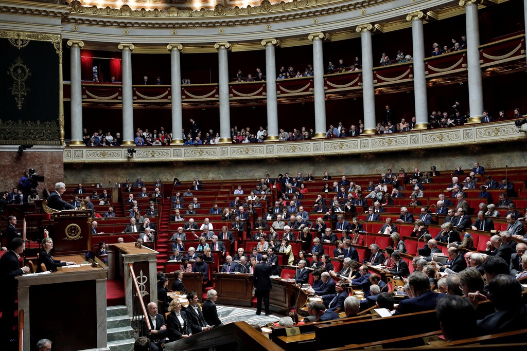 Newly appointed French Prime Minister Bernard Cazeneuve (C) speaks during the questions to the government session at the National Assembly in Paris, France, December 7, 2016. REUTERS/Benoit Tessier - RTSV3MH