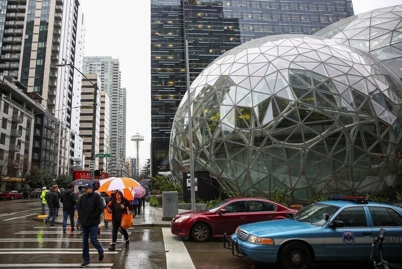 The Amazon Spheres are seen from Lenora Street, the Space Needle in the background, at AmazonÕs Seattle headquarters in Seattle, Washington, U.S., January 29, 2018. REUTERS/Lindsey Wasson - RC15BBAE0BE0