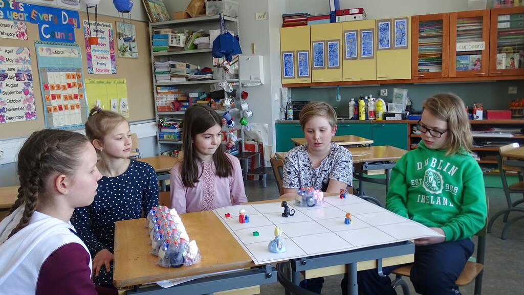 Students use a Blue-bots, a programmable robots, during their lesson at the school in Tampere, Finland March 27, 2017. REUTERS/Attila Cser - RC1E019D6C80