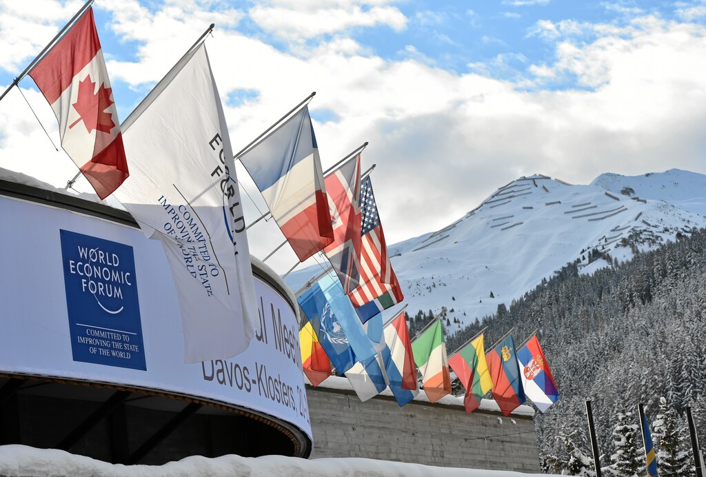 View of the Congress Center with the flags in front of snowy mountains ahead of the Annual Meeting 2016 of the World Economic Forum in Davos, Switzerland, January 19, 2016.