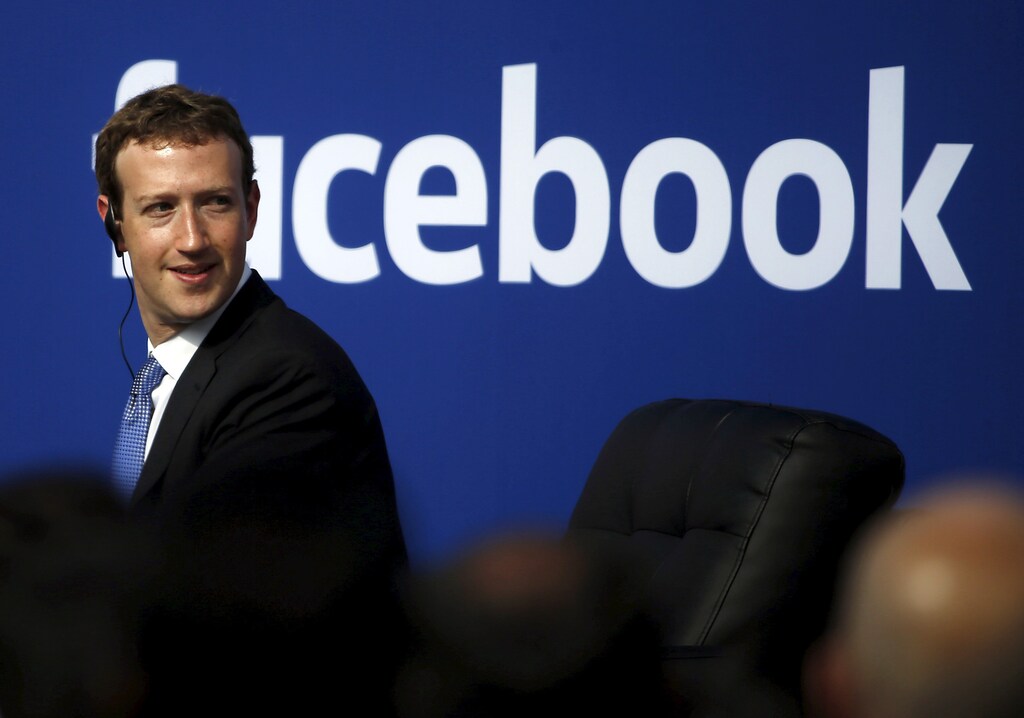 Facebook CEO Mark Zuckerberg is seen on stage during a town hall at Facebook's headquarters in Menlo Park, California September 27, 2015. Picture taken February 27, 2015.