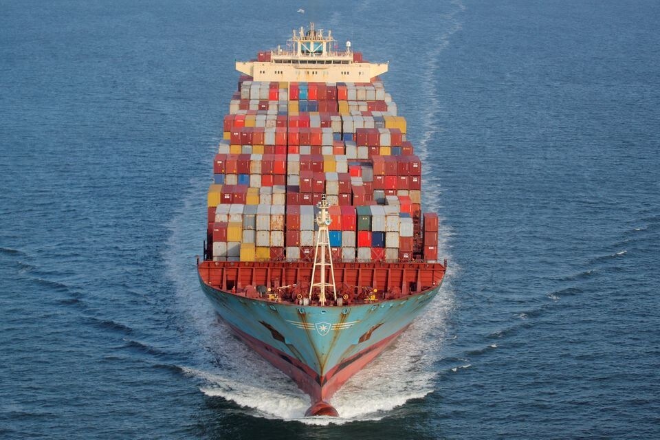 Containers are stacked on the deck of the cargo ship as it's underway in New York Harbor