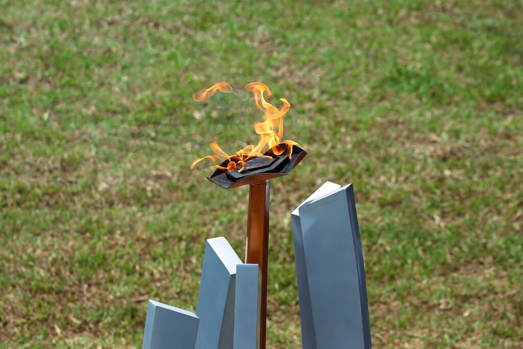 The flame of hope burns during a commemoration ceremony of the 25th anniversary of the genocide at the Genocide Memorial in Gisozi in Kigali, Rwanda April 7, 2019.REUTERS/Baz Ratner - RC155E591C20