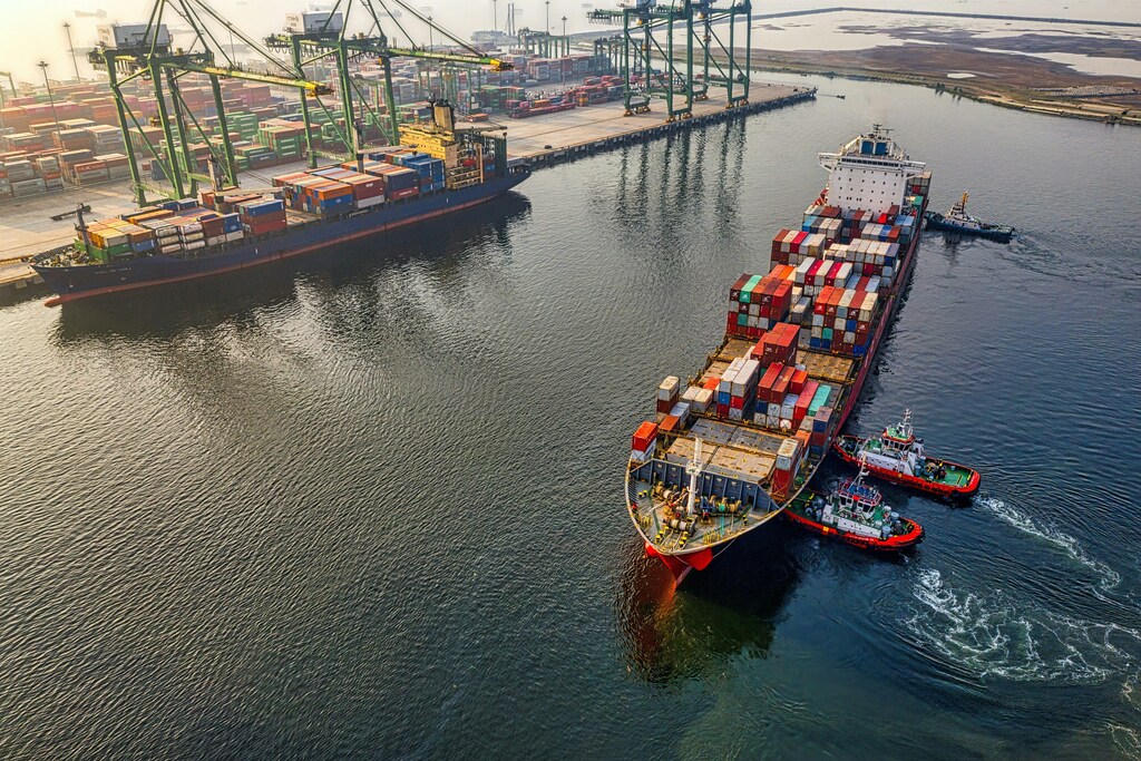 Cargo ships on water during daytime.