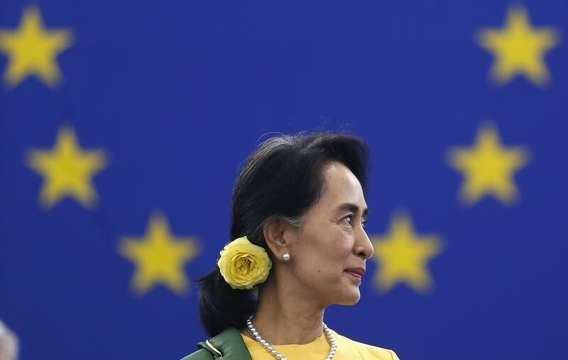 Myanmar pro-democracy leader Aung San Suu Kyi attends an award ceremony to receive her 1990 Sakharov Prize at the European Parliament in Strasbourg, October 22, 2013. The European Parliament awarded its top human rights prize in 1990 to Suu Kyi, who was then not allowed to leave her country to attend the ceremony. REUTERS/Vincent Kessler (FRANCE - Tags: POLITICS) - GM1E9AM1ISV01