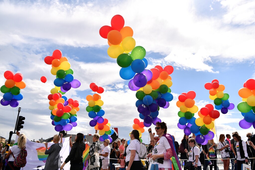 People march during the annual Gay Pride parade in central Stockholm, Sweden August 5, 2017. Erik Simander/TT News Agency/via REUTERS ATTENTION EDITORS - THIS IMAGE WAS PROVIDED BY A THIRD PARTY. SWEDEN OUT. - RC15E2F4FF50
